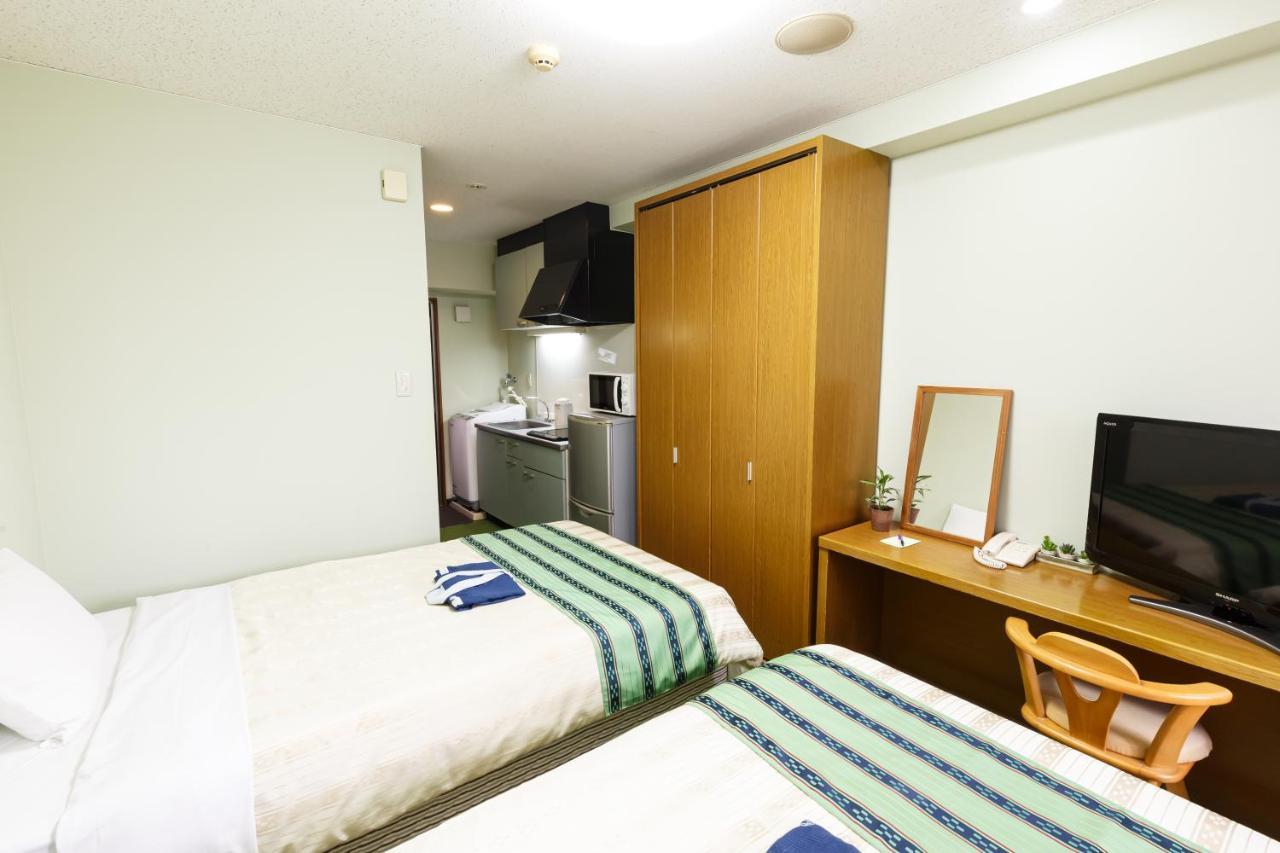 Hotel Peace Land Kume Naha Buitenkant foto