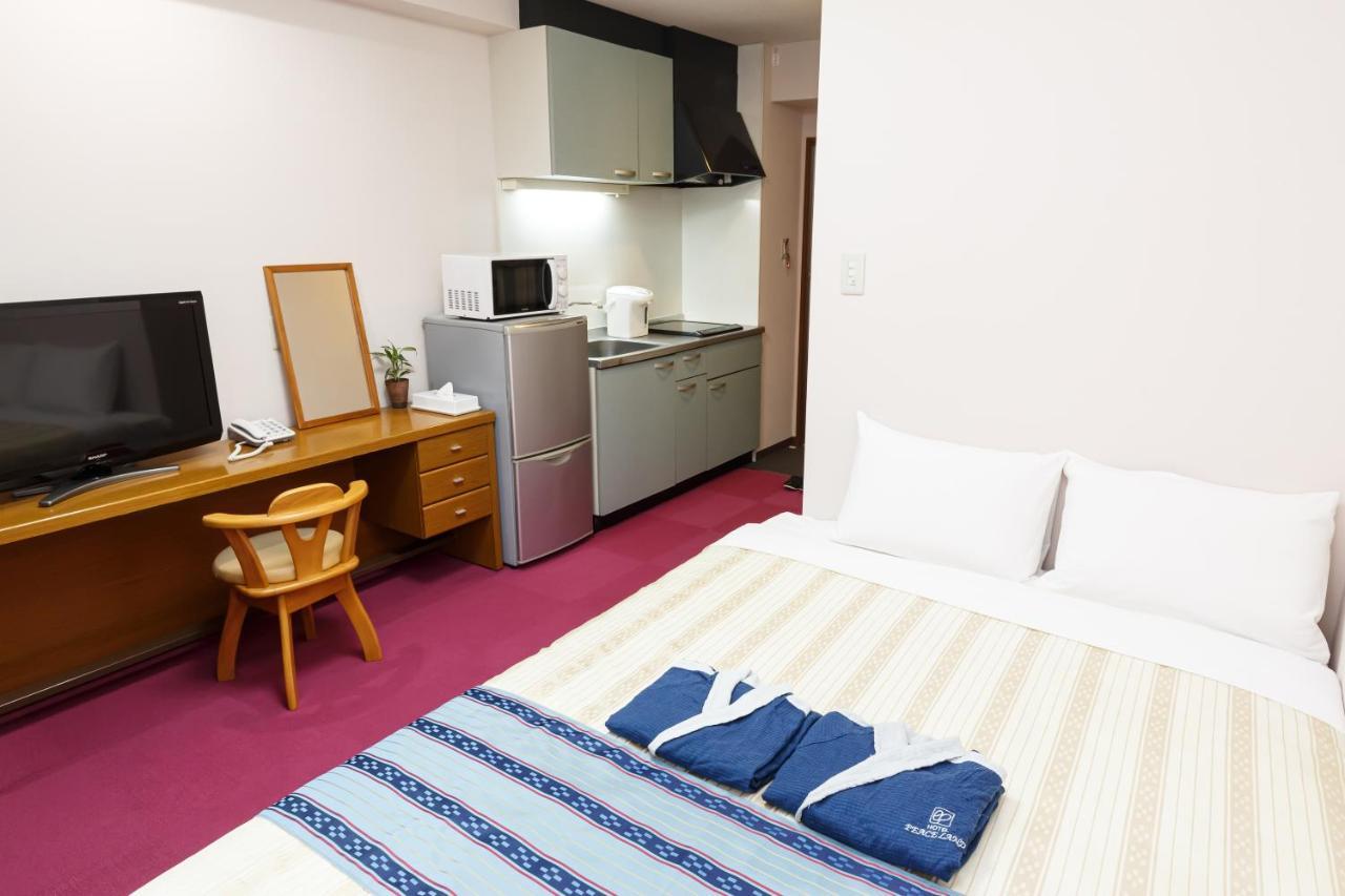 Hotel Peace Land Kume Naha Buitenkant foto