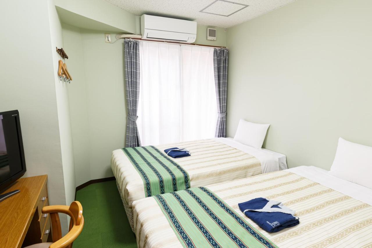 Hotel Peace Land Kume Naha Buitenkant foto