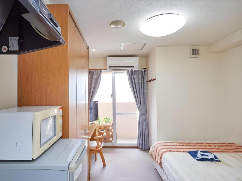 Hotel Peace Land Kume Naha Buitenkant foto