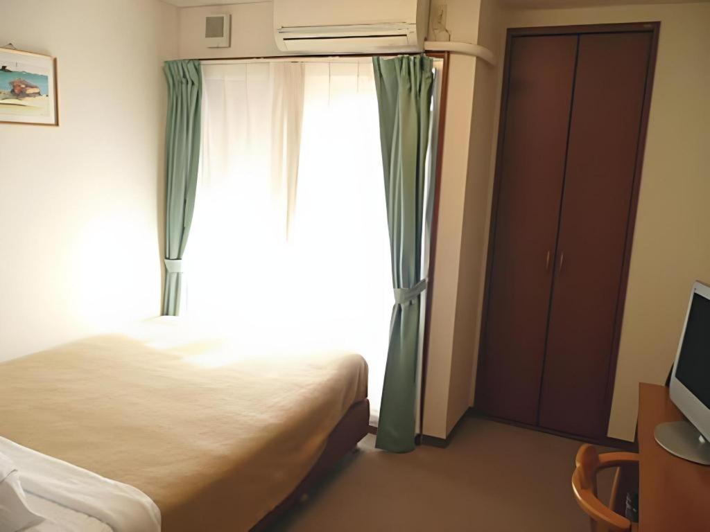 Hotel Peace Land Kume Naha Buitenkant foto