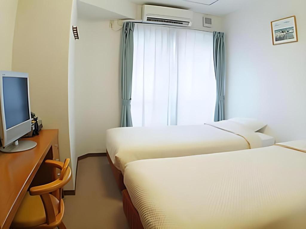 Hotel Peace Land Kume Naha Buitenkant foto