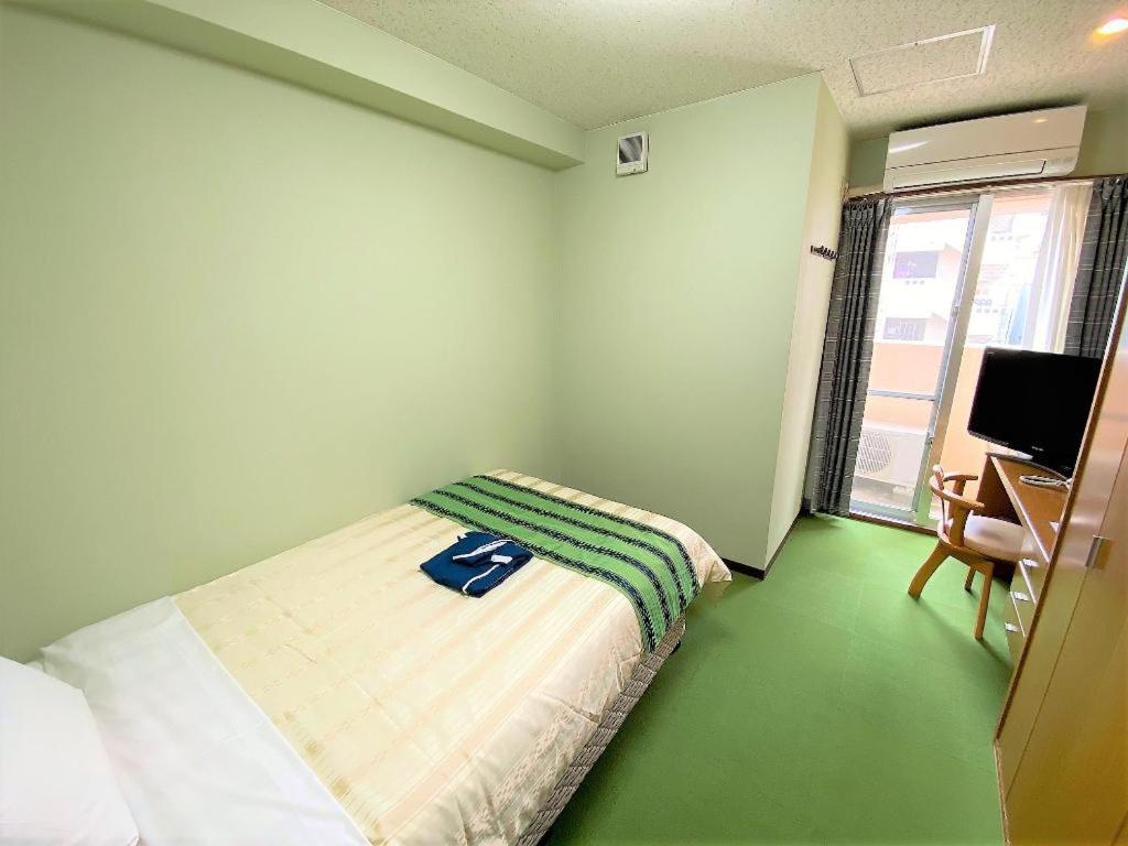 Hotel Peace Land Kume Naha Buitenkant foto